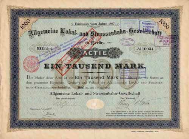 Altes deutsches Aktienzertifikat mit rotem Stempel und gedrucktem Text.